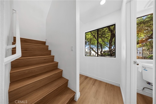 105 S Marguerita Ave Unit A, Alhambra, CA 91801 - staircase with wood finished floors, plenty of natural light, and baseboards