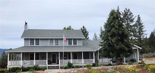 1014 Dusty Rd, Frazier Park, CA 93225 - farmhouse-style home featuring a porch, a chimney, and roof with shingles