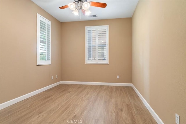 26392 Fowler Dr, Loma Linda, CA 92354 - empty room featuring light wood finished floors, a ceiling fan, and baseboards