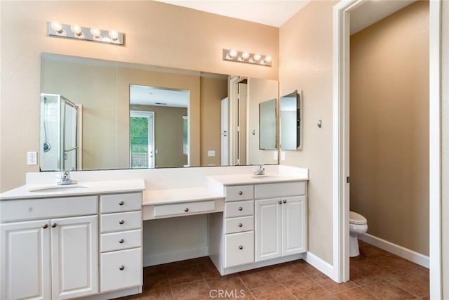 26392 Fowler Dr, Loma Linda, CA 92354 - bathroom featuring a shower stall, tile patterned floors, toilet, and vanity