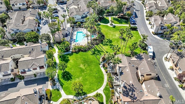 aerial view of residential area featuring a pool