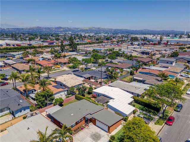 aerial perspective of suburban area featuring a mountainous background