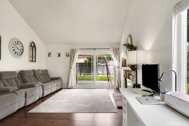 13607 Chaparral Trl, Yucaipa, CA 92399 - living area with a textured ceiling, wood finished floors, and high vaulted ceiling