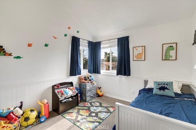 13607 Chaparral Trl, Yucaipa, CA 92399 - bedroom with carpet flooring, a wainscoted wall, and lofted ceiling