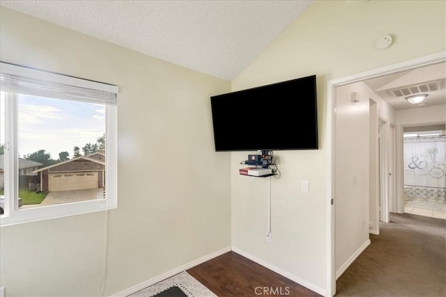 13607 Chaparral Trl, Yucaipa, CA 92399 - detailed view of a smoke detector, baseboards, and a textured ceiling