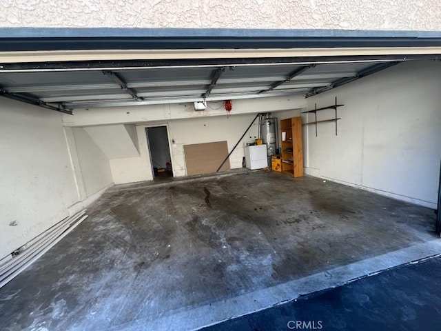 garage featuring water heater
