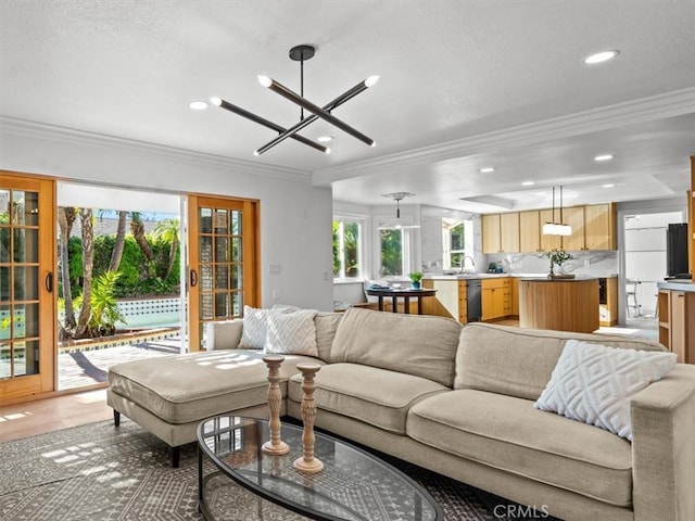5505 Paseo Joaquin, Yorba Linda, CA 92886 - living room featuring ornamental molding, a chandelier, and recessed lighting