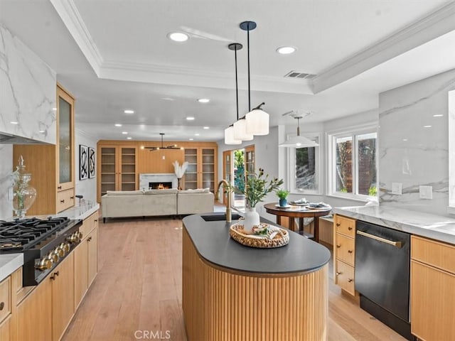5505 Paseo Joaquin, Yorba Linda, CA 92886 - kitchen featuring gas stovetop, dishwasher, a raised ceiling, ornamental molding, and light wood finished floors