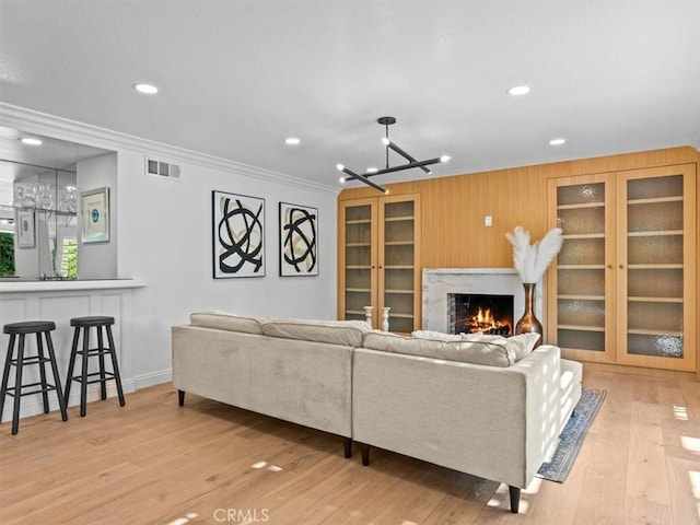 5505 Paseo Joaquin, Yorba Linda, CA 92886 - living area featuring crown molding, wood finished floors, recessed lighting, a fireplace, and baseboards