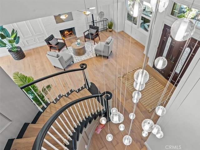 5505 Paseo Joaquin, Yorba Linda, CA 92886 - stairs with wood finished floors and a large fireplace