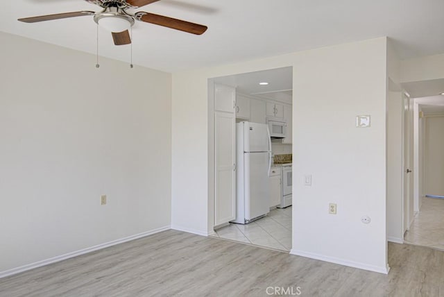 3336 Punta Alta Unit 2F, Laguna Woods, CA 92637 - unfurnished room featuring a ceiling fan, light wood-style floors, baseboards, and recessed lighting
