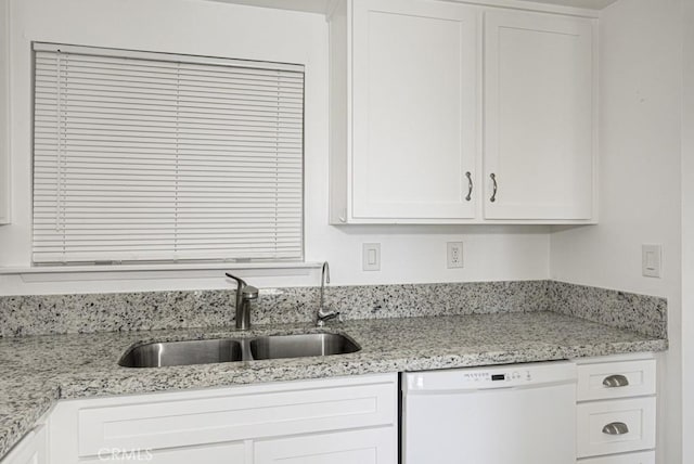 3336 Punta Alta Unit 2F, Laguna Woods, CA 92637 - kitchen featuring white dishwasher, a sink, white cabinetry, and light stone countertops