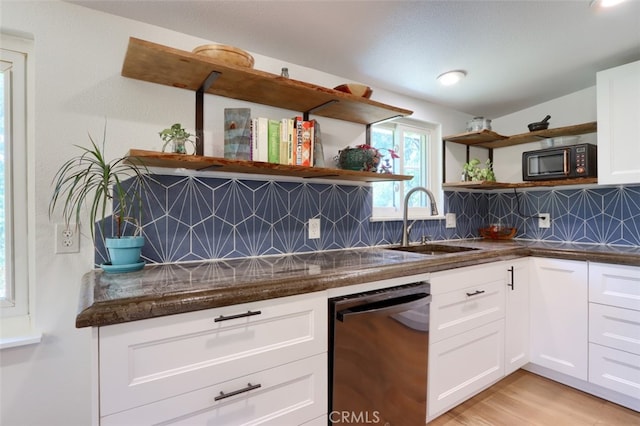 5192 Oak Rd, Mariposa, CA 95345 - kitchen featuring open shelves, dishwashing machine, a sink, and black microwave