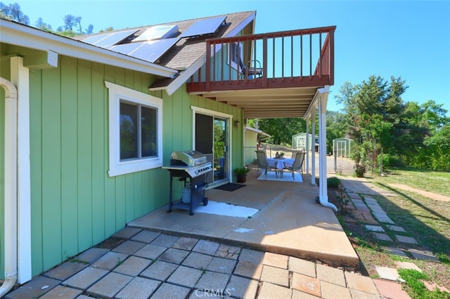 5192 Oak Rd, Mariposa, CA 95345 - view of patio / terrace with a storage unit, grilling area, and an outdoor structure