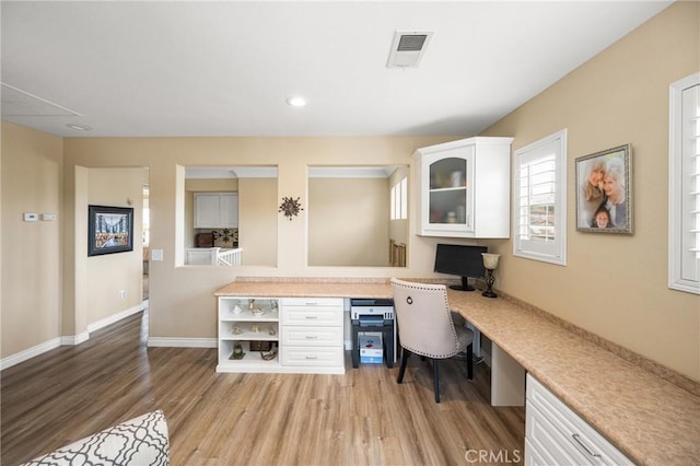 23725 Scarlet Oak Dr, Murrieta, CA 92562 - office space featuring built in desk, light wood-style floors, baseboards, and recessed lighting