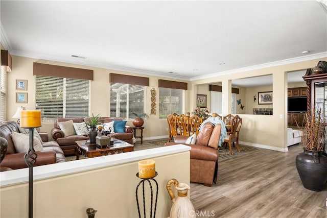 23725 Scarlet Oak Dr, Murrieta, CA 92562 - living room with ornamental molding, light wood-style flooring, and baseboards