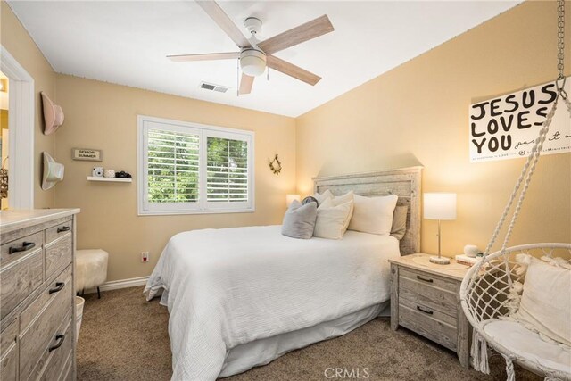 23725 Scarlet Oak Dr, Murrieta, CA 92562 - bedroom featuring dark colored carpet, baseboards, and ceiling fan