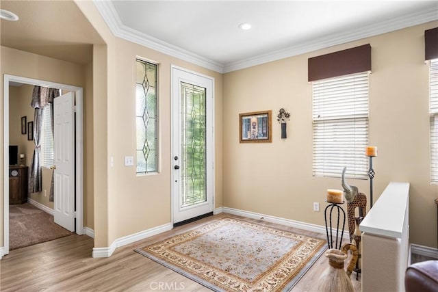 23725 Scarlet Oak Dr, Murrieta, CA 92562 - foyer entrance with crown molding, baseboards, light wood-type flooring, and recessed lighting