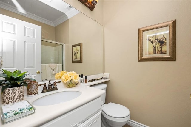 23725 Scarlet Oak Dr, Murrieta, CA 92562 - bathroom featuring crown molding, a stall shower, toilet, and vanity
