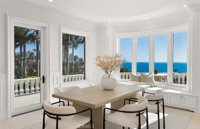 71 Ritz Cove Dr, Dana Point, CA 92629 - dining area with a water view, crown molding, and recessed lighting