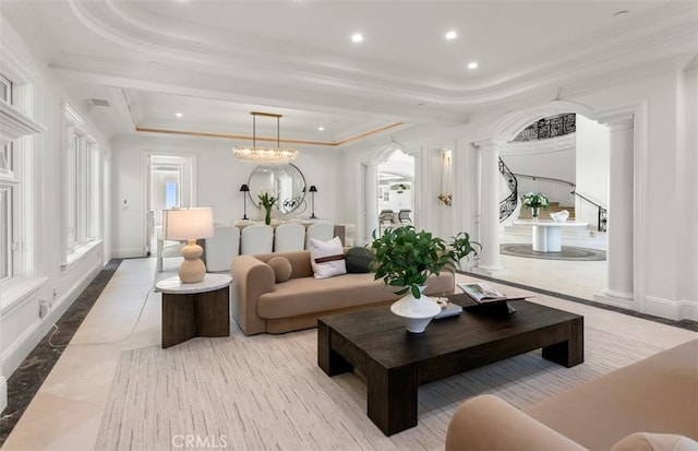 71 Ritz Cove Dr, Dana Point, CA 92629 - living area featuring ornate columns, a tray ceiling, arched walkways, recessed lighting, and ornamental molding