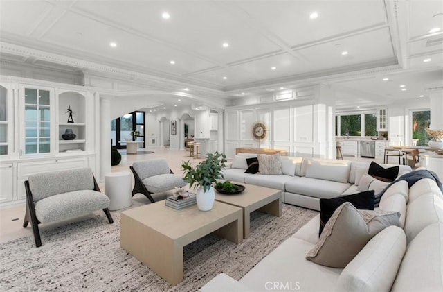 71 Ritz Cove Dr, Dana Point, CA 92629 - living room featuring a decorative wall, coffered ceiling, arched walkways, recessed lighting, and crown molding