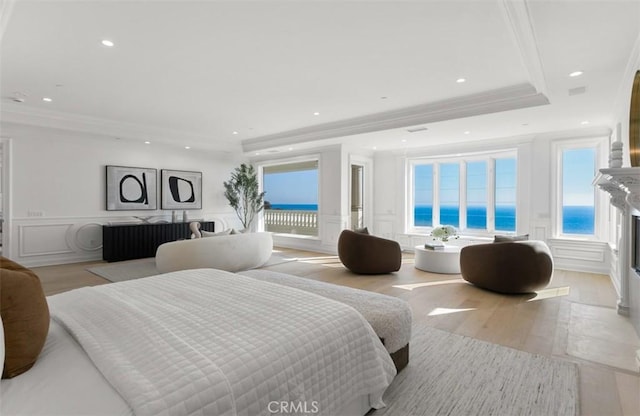 71 Ritz Cove Dr, Dana Point, CA 92629 - bedroom with a decorative wall, access to outside, light wood finished floors, crown molding, and wainscoting