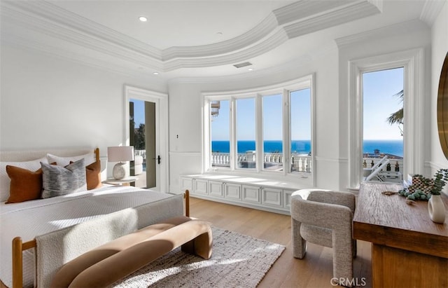 71 Ritz Cove Dr, Dana Point, CA 92629 - bedroom featuring ornamental molding, light wood-type flooring, a water view, and recessed lighting