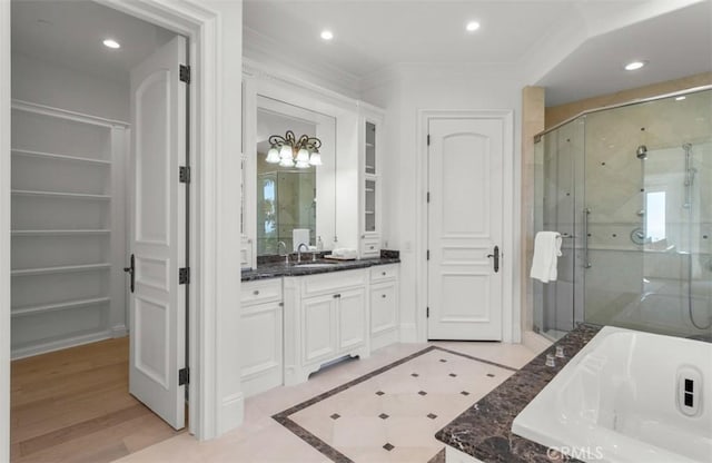71 Ritz Cove Dr, Dana Point, CA 92629 - full bath featuring a stall shower, a bath, vanity, crown molding, and recessed lighting