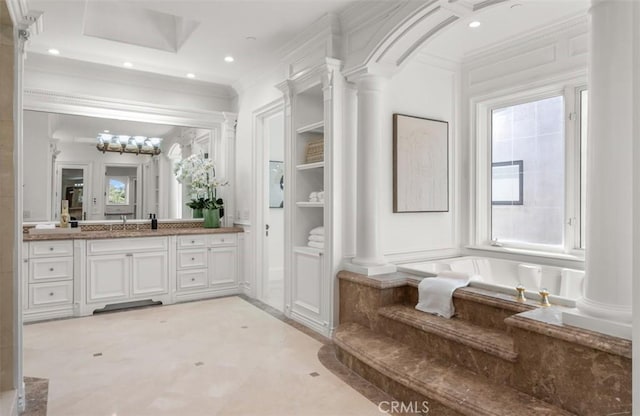 71 Ritz Cove Dr, Dana Point, CA 92629 - bathroom with decorative columns, ornamental molding, vanity, recessed lighting, and a bathtub