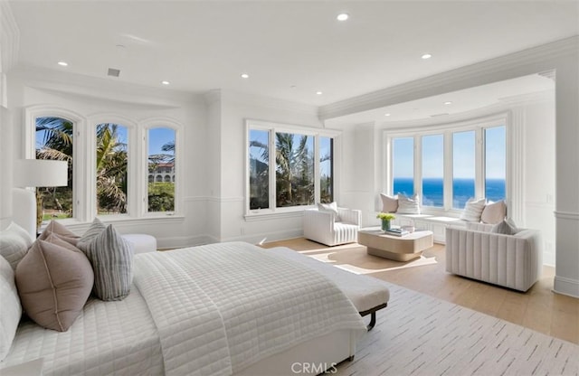 71 Ritz Cove Dr, Dana Point, CA 92629 - bedroom with ornamental molding, light wood-style floors, a water view, and recessed lighting