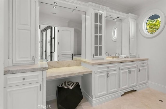 71 Ritz Cove Dr, Dana Point, CA 92629 - bathroom with vanity, baseboards, ornamental molding, and recessed lighting