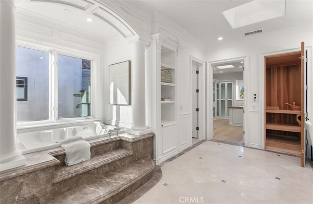 71 Ritz Cove Dr, Dana Point, CA 92629 - bathroom with ornate columns, recessed lighting, ornamental molding, and a skylight