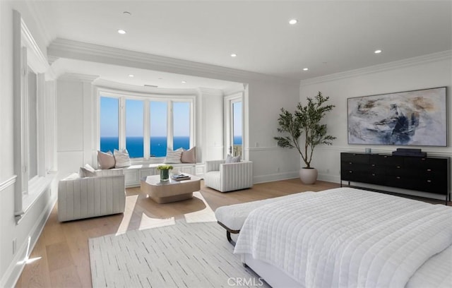 71 Ritz Cove Dr, Dana Point, CA 92629 - bedroom with crown molding, light wood-style floors, a water view, and recessed lighting