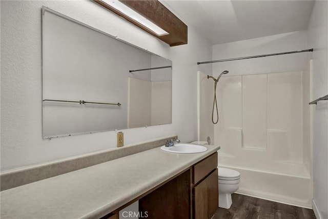 19270 Mountain S, Hidden Valley Lake, CA 95467 - full bathroom featuring wood finished floors, toilet, vanity, and shower / bath combination