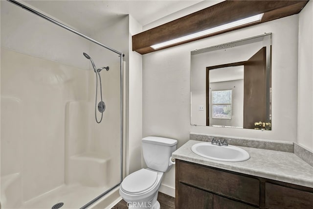 19270 Mountain S, Hidden Valley Lake, CA 95467 - full bath with a stall shower, vanity, toilet, and wood finished floors