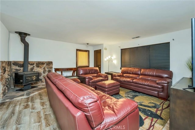 19270 Mountain S, Hidden Valley Lake, CA 95467 - living area featuring wood finished floors and a wood stove
