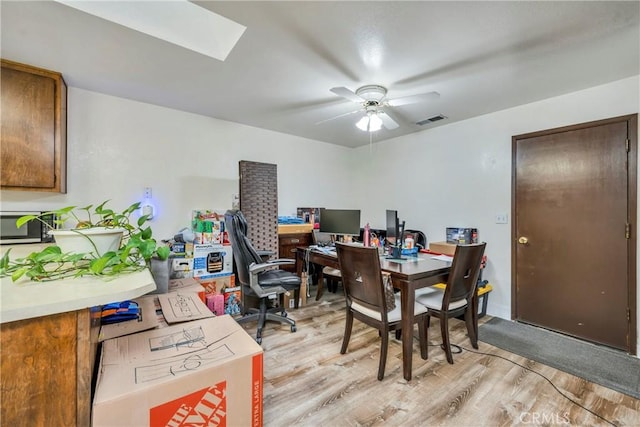 19270 Mountain S, Hidden Valley Lake, CA 95467 - office featuring light wood finished floors, a ceiling fan, and a skylight