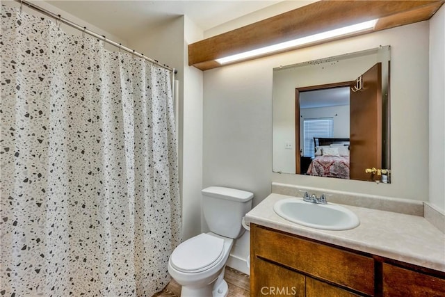 19270 Mountain S, Hidden Valley Lake, CA 95467 - full bathroom with ensuite bathroom, toilet, vanity, curtained shower, and wood finished floors