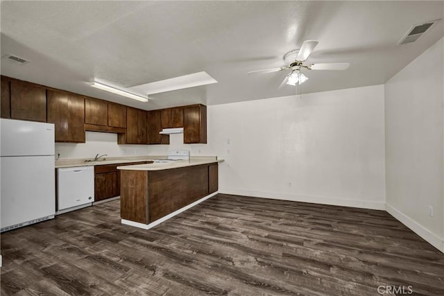 19270 Mountain S, Hidden Valley Lake, CA 95467 - kitchen featuring white appliances, under cabinet range hood, dark wood-style flooring, ceiling fan, and light countertops