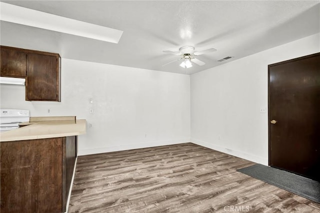 19270 Mountain S, Hidden Valley Lake, CA 95467 - unfurnished dining area with ceiling fan, wood finished floors, and baseboards