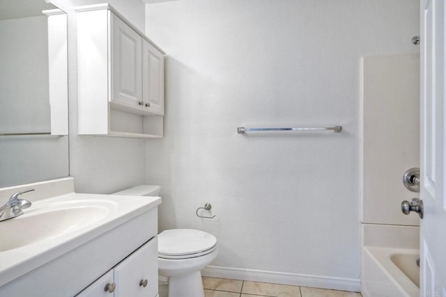 full bathroom featuring tile patterned floors, vanity, baseboards, toilet, and bathtub / shower combination