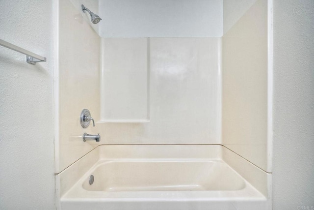 bathroom with shower / bathtub combination