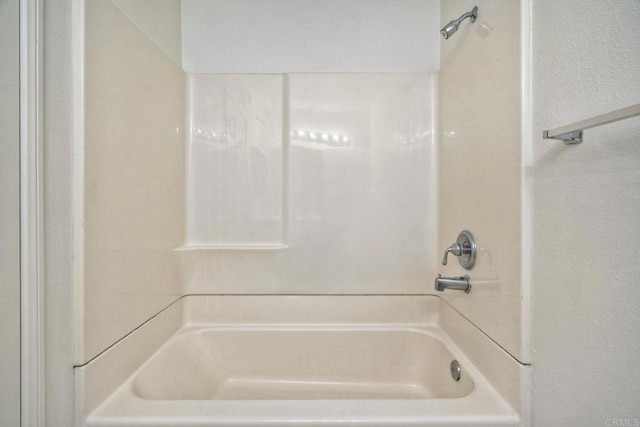 full bath featuring washtub / shower combination