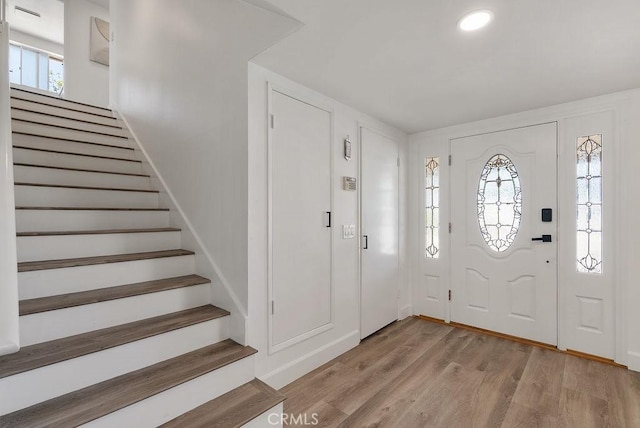 3238 N Hartman St, Orange, CA 92865 - foyer entrance with stairs and light wood-type flooring