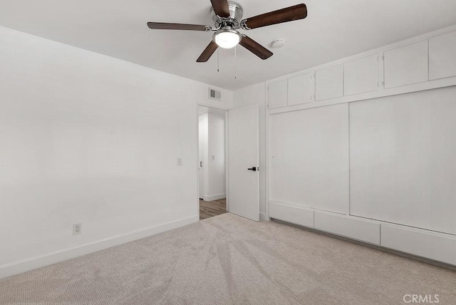 3238 N Hartman St, Orange, CA 92865 - unfurnished bedroom featuring carpet, baseboards, a closet, and ceiling fan