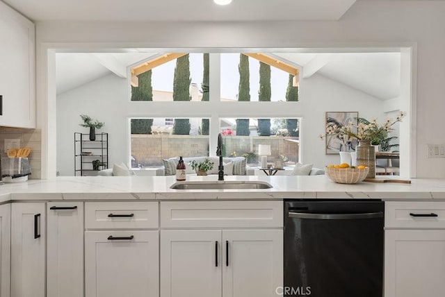 3238 N Hartman St, Orange, CA 92865 - kitchen featuring dishwashing machine, a sink, white cabinets, and light stone counters
