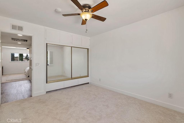 3238 N Hartman St, Orange, CA 92865 - unfurnished bedroom with light carpet, baseboards, and a closet