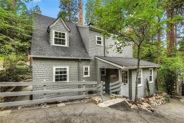 27844 Greenway Dr, Lake Arrowhead, CA 92352 - view of front of house with fence and roof with shingles