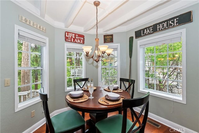 27844 Greenway Dr, Lake Arrowhead, CA 92352 - dining space featuring beam ceiling, a chandelier, dark wood-type flooring, and baseboards